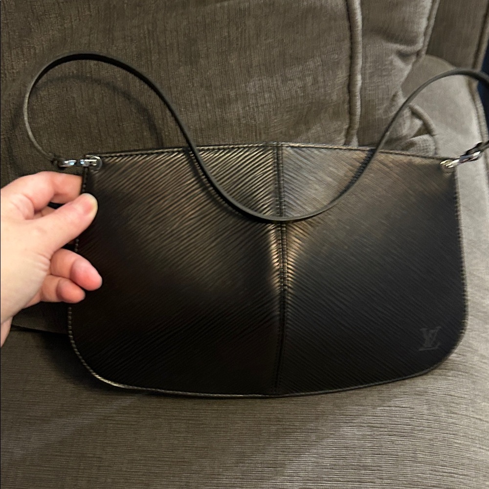 Louis Vuitton Textured Black Handbag. Demi lune noir epi leather handbag